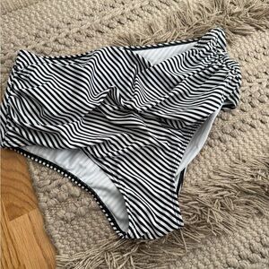 Black and White Striped High-Waisted Bikini Bottom with flowy peach tanks top.